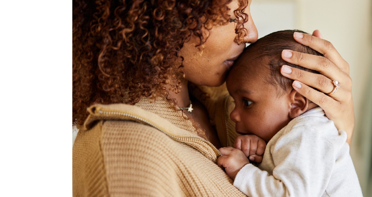 Mothering holding baby. Maternal 
