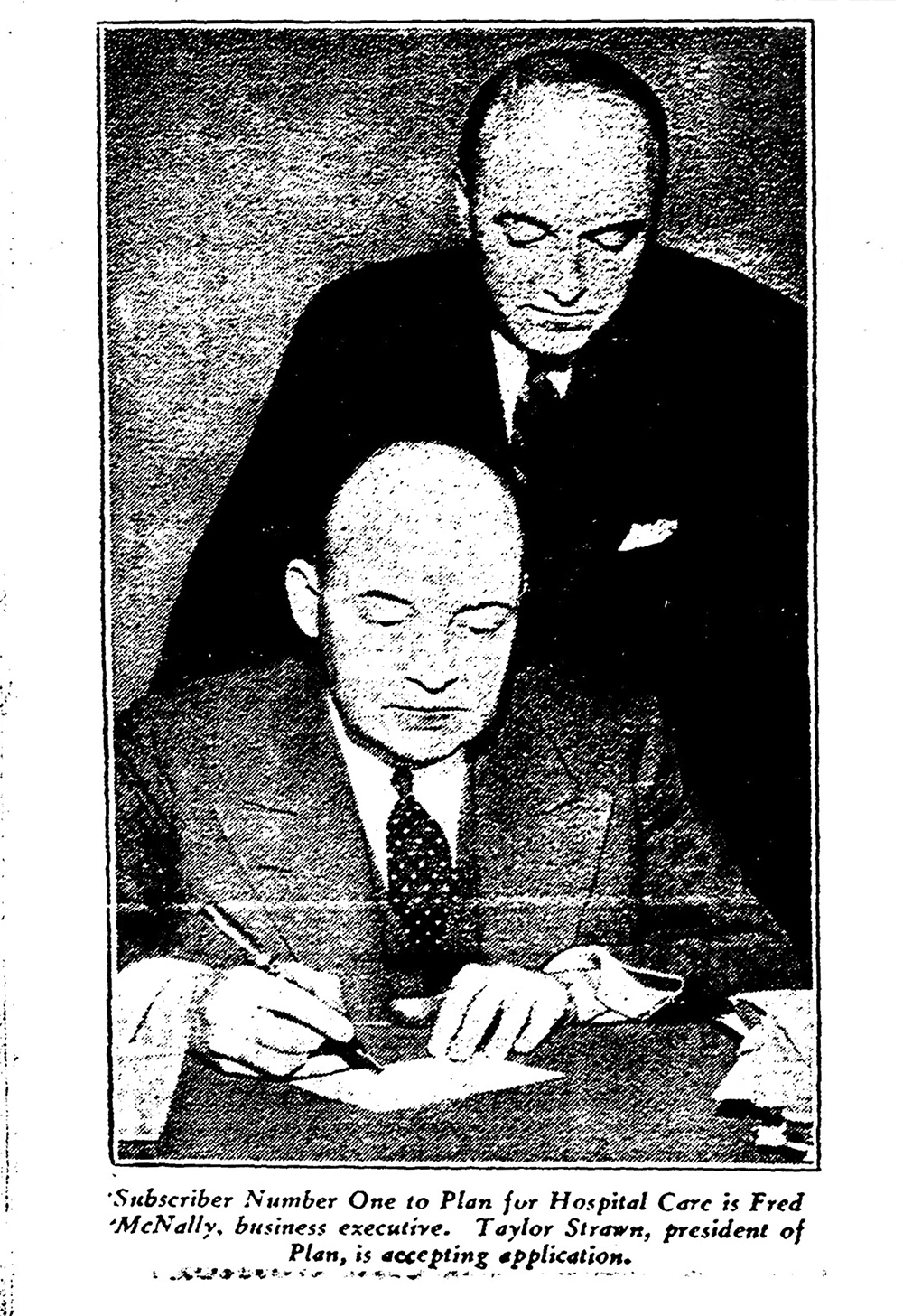 HCSC newspaper clipping of Fred McNally signing document